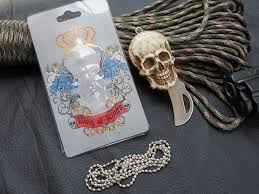 มีดห้อยคอหัวกะโหลก มาพร้อมสร้อยไข่ปลา ด้านหลังมีระบบกลไกซ่อนใบมีด (มีใบดำ)