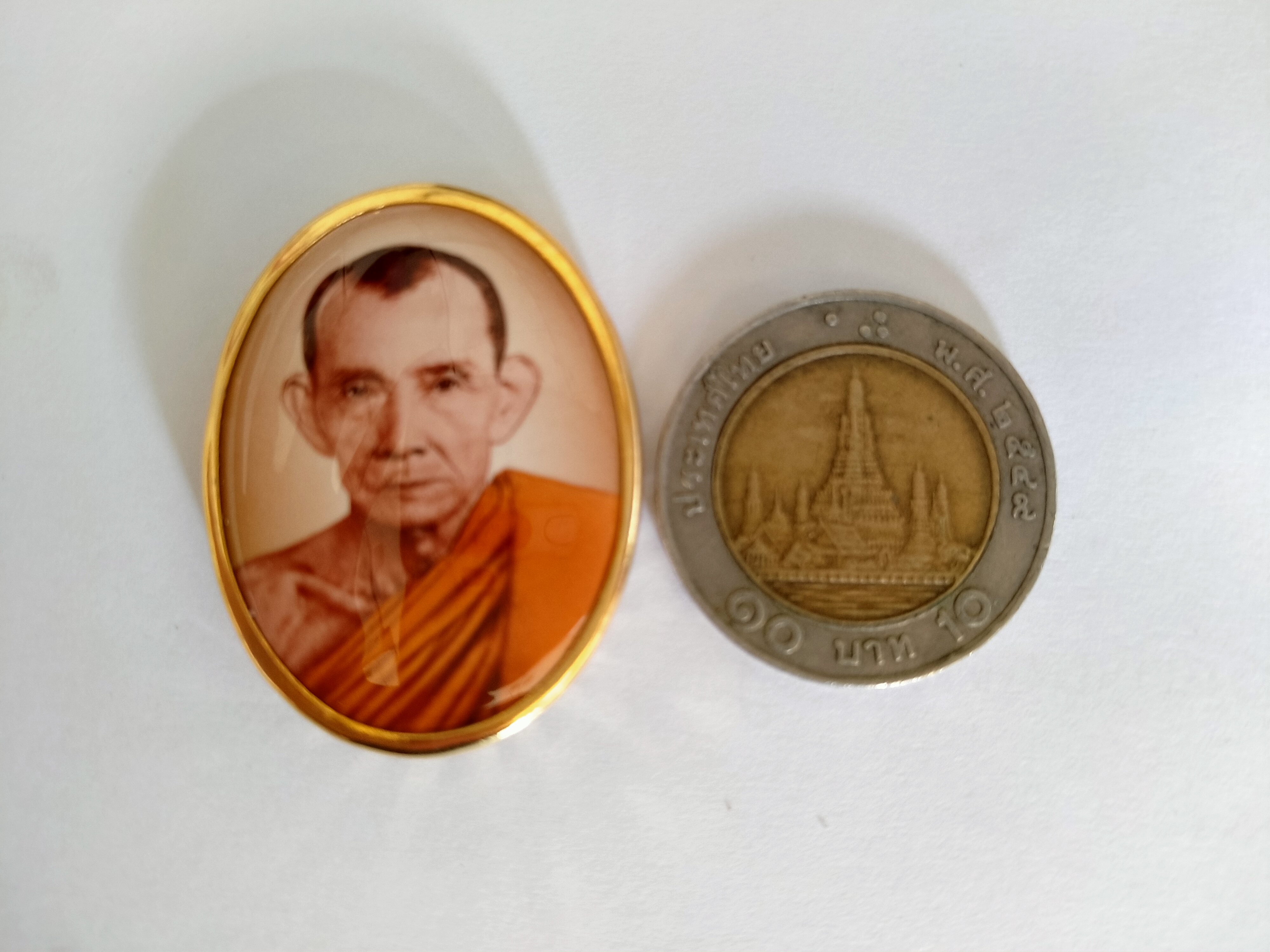 ล็อกเกตหลวงพ่อกวยหน้าเดียวอุดผงสายเมตตาเสน่ห์ องค์ใหญ่ เข้าพิธีหลายวัด