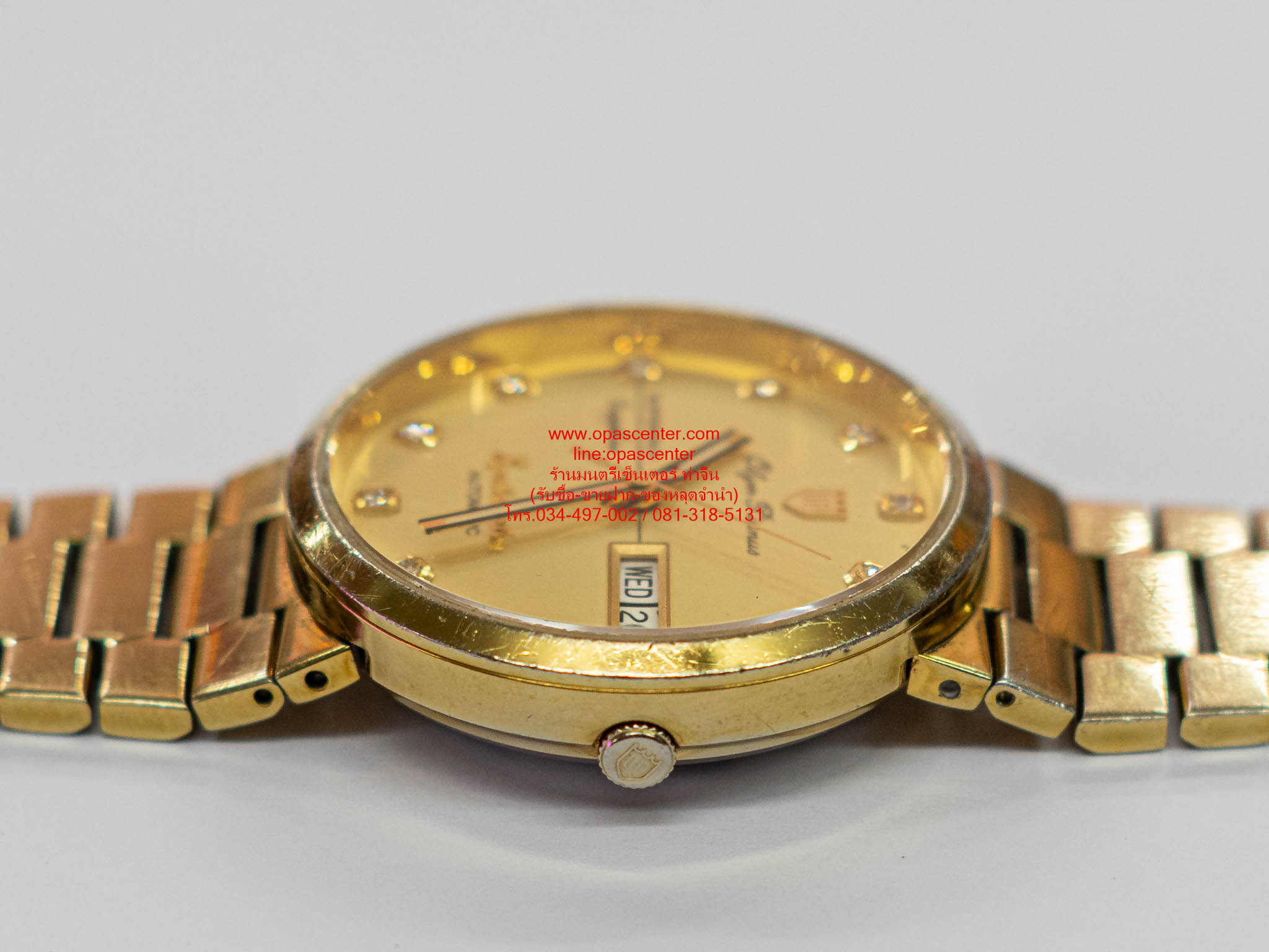 นาฬิกาข้อมือผู้ชาย O.P Sportmaster Automatic สแตนเลสแท้ รุ่น 890-09AM-423 (สีทอง / หน้าปัดทอง) มือสอง สภาพดี