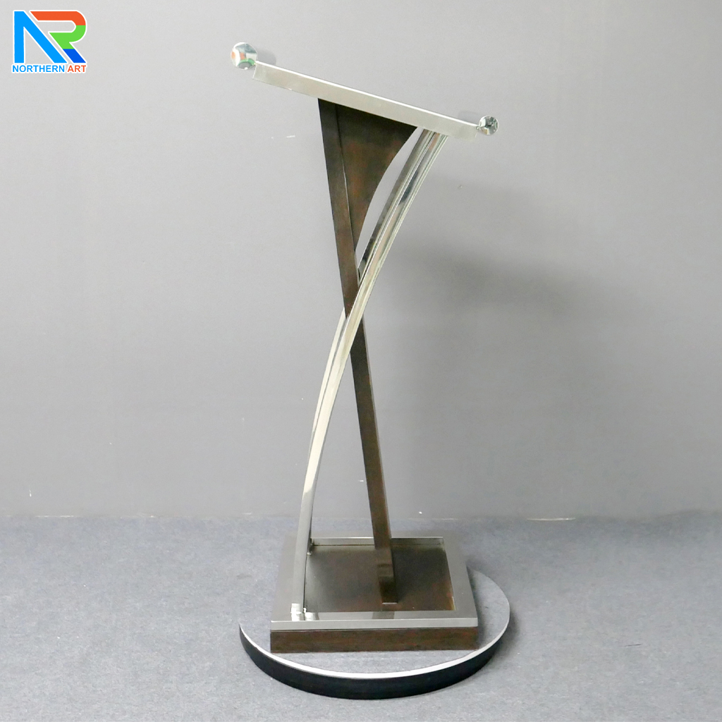 โพเดียมไม้จริง สีโอ๊คน้ำตาล PD-01 ขนาด (W) 48x (L) 51 (H) 120 cm Top หุ้มสแตนเลส เกรด 304 พร้อมตกแต่งเสาโค้งสแตนเลส