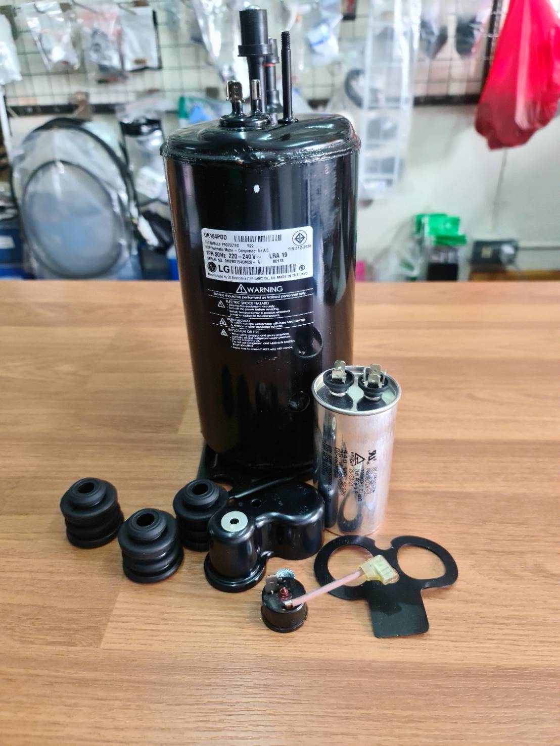 0000711 คอม เพรสเซอร์ แอลจี LG QK164PDD คอมแอร์แบบ โรตารี่ น้ำยาR22 ขนาด9350BTU คอมเพรสเซอร์สำหรับเครื่องปรับอากาศ