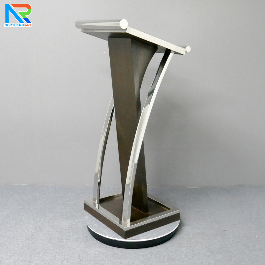 โพเดียมไม้จริง สีโอ๊คน้ำตาล PD-01 ขนาด (W) 48x (L) 51 (H) 120 cm Top หุ้มสแตนเลส เกรด 304 พร้อมตกแต่งเสาโค้งสแตนเลส