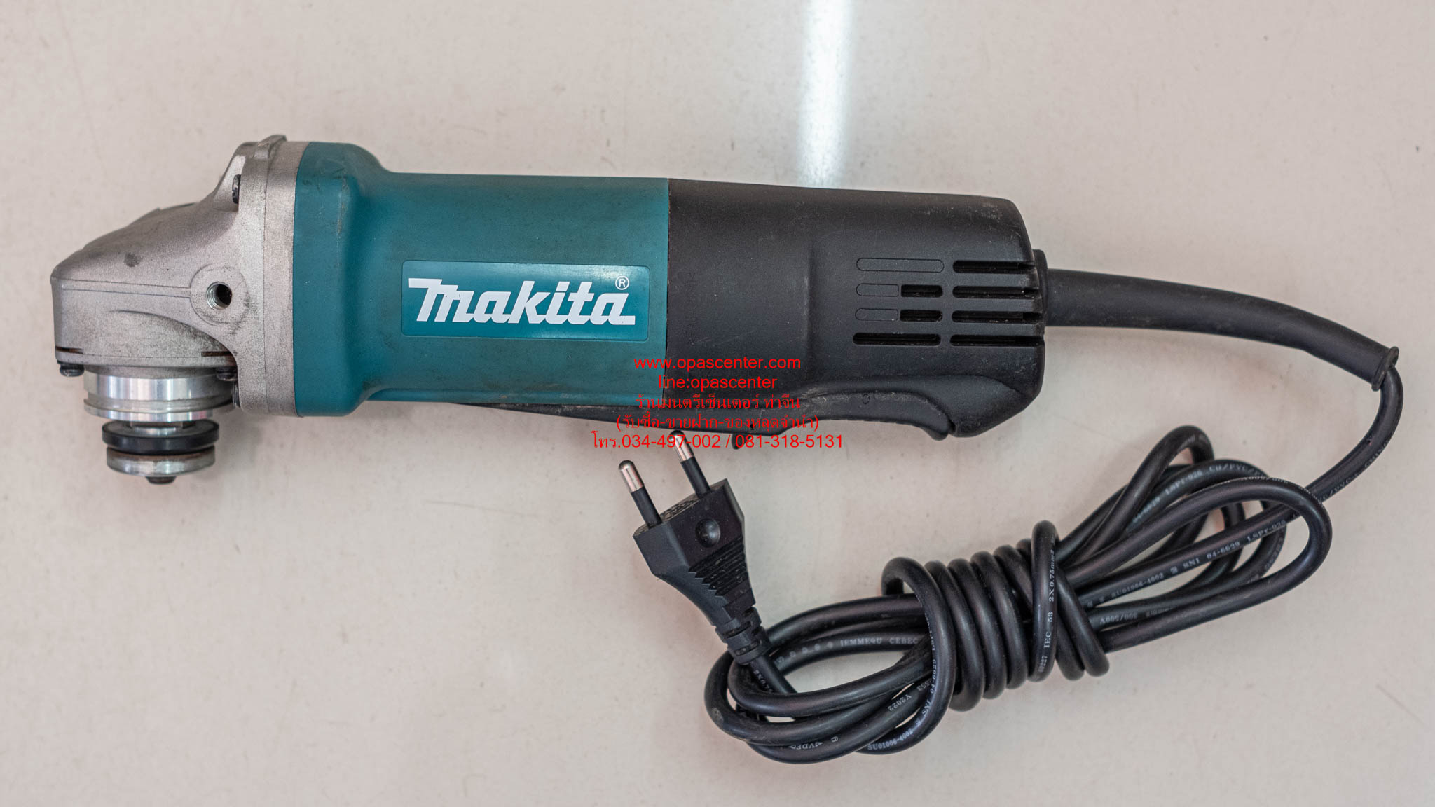 เครื่องเจียรไฟฟ้ามากีต้าร์ MAKITA 4 นิ้ว 840 วัตต์ รุ่น 9556HP ความเร็วรอบ 11,000 รอบ/นาที สวิตช์บีบ ของแท้ มือสอง สภาพดี