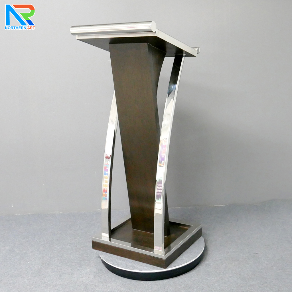 โพเดียมไม้จริง สีโอ๊คน้ำตาล PD-01 ขนาด (W) 48x (L) 51 (H) 120 cm Top หุ้มสแตนเลส เกรด 304 พร้อมตกแต่งเสาโค้งสแตนเลส