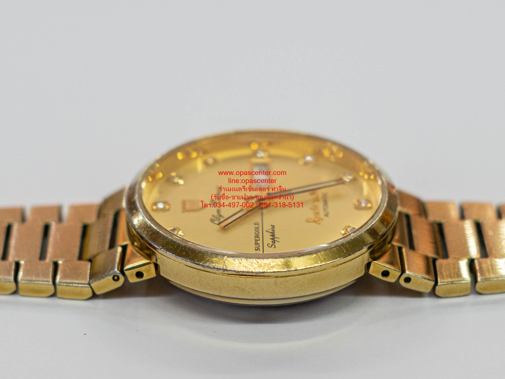 นาฬิกาข้อมือผู้ชาย O.P Sportmaster Automatic สแตนเลสแท้ รุ่น 890-09AM-423 (สีทอง / หน้าปัดทอง) มือสอง สภาพดี