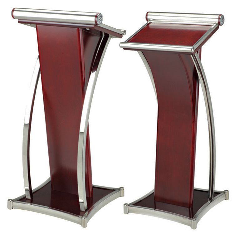 โพเดียมไม้ สีโอ๊ค ขนาด (W)50 x (L)40 x (H)117 cm. ตกแต่งเสาโค้งสแตนเลส ด้านข้าง Top และฐาน หุ้มสแตนเลส เกรด201