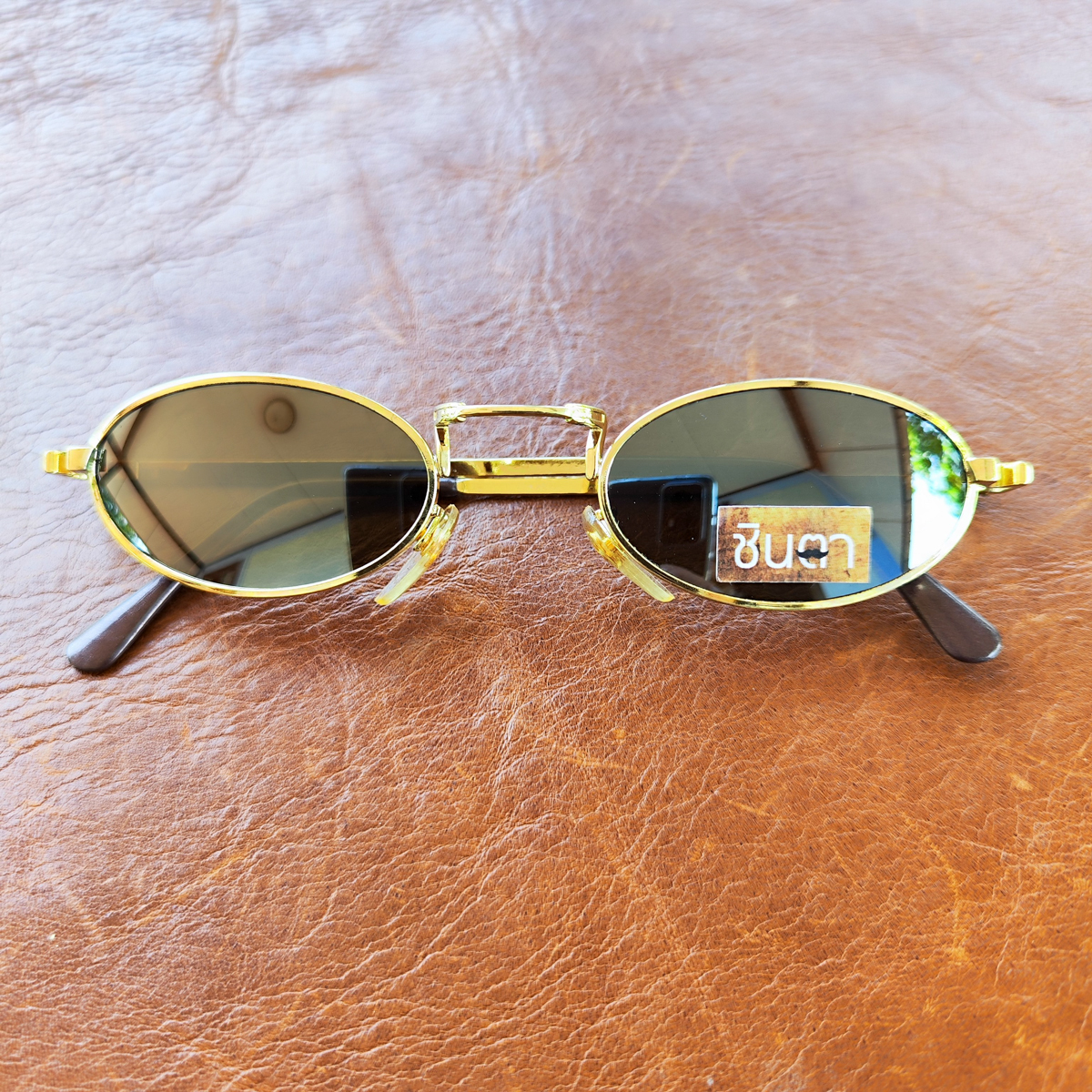 แว่นวินเทจ แว่นตากันแดด แว่น Handmade แว่นเก่าเก็บยุค 90 ชินตา รุ่น Only Ree Gold ทรงรี กรอบสีทอง เท่ห์ๆ ไม่ซ้ำใคร ใช้เลนส์กันแดดคุณภาพดี ใส่ได้ทั้งชายและหญิง