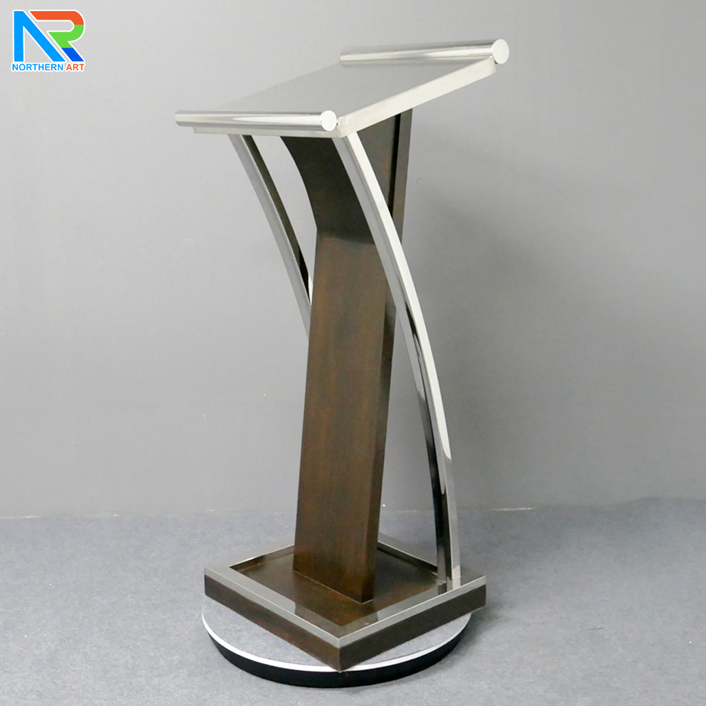 โพเดียมไม้จริง สีโอ๊คน้ำตาล PD-01 ขนาด (W) 48x (L) 51 (H) 120 cm Top หุ้มสแตนเลส เกรด 304 พร้อมตกแต่งเสาโค้งสแตนเลส