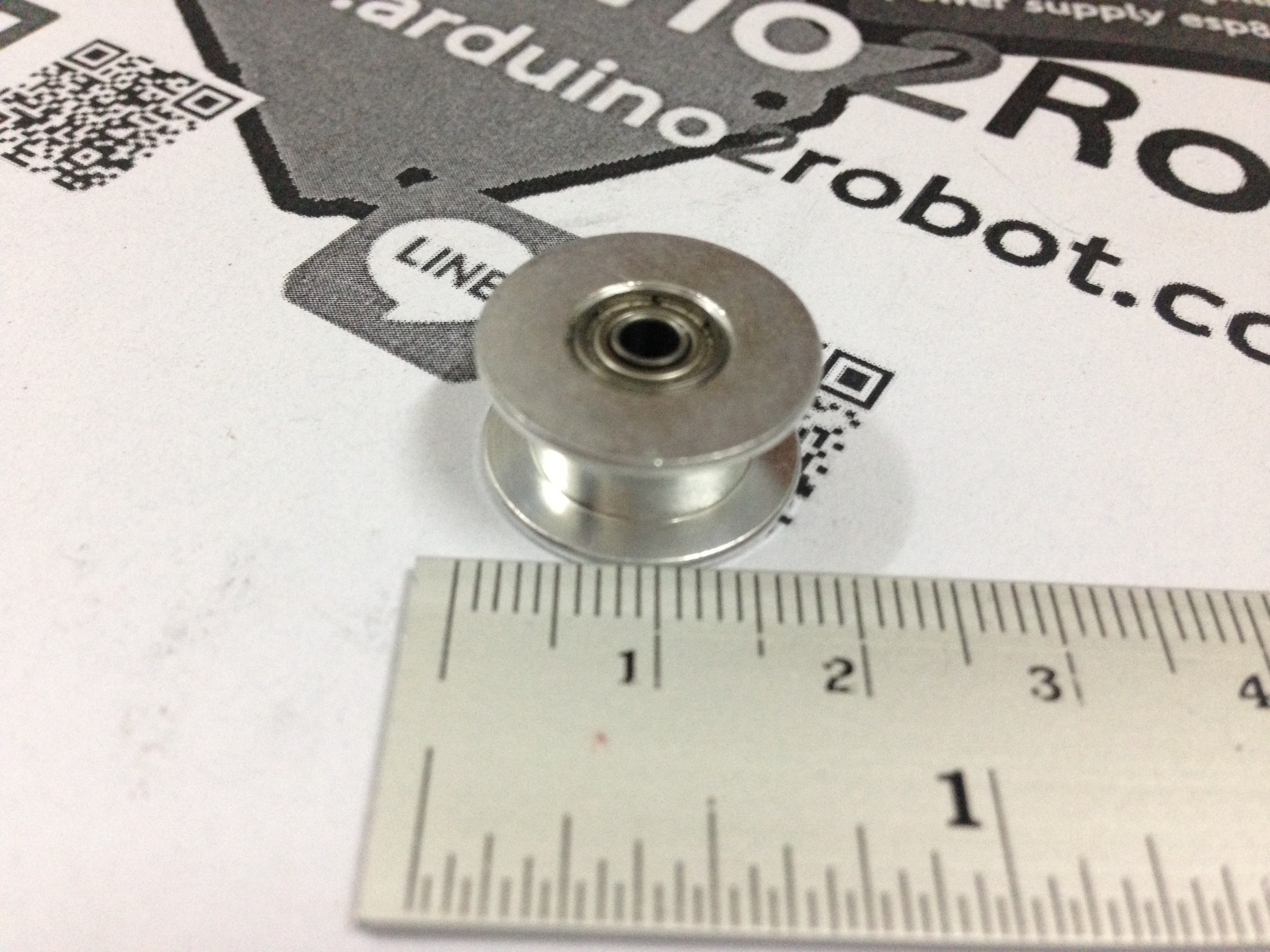 Pulley ไม่มีฟัน ขนาดเท่าพูลเล่ย์ 20ฟัน สำหรับสายพานกว้าง 6mm แบบมีลูกปืนด้านในหมุนอิสระ สำหรับแกน 3mm