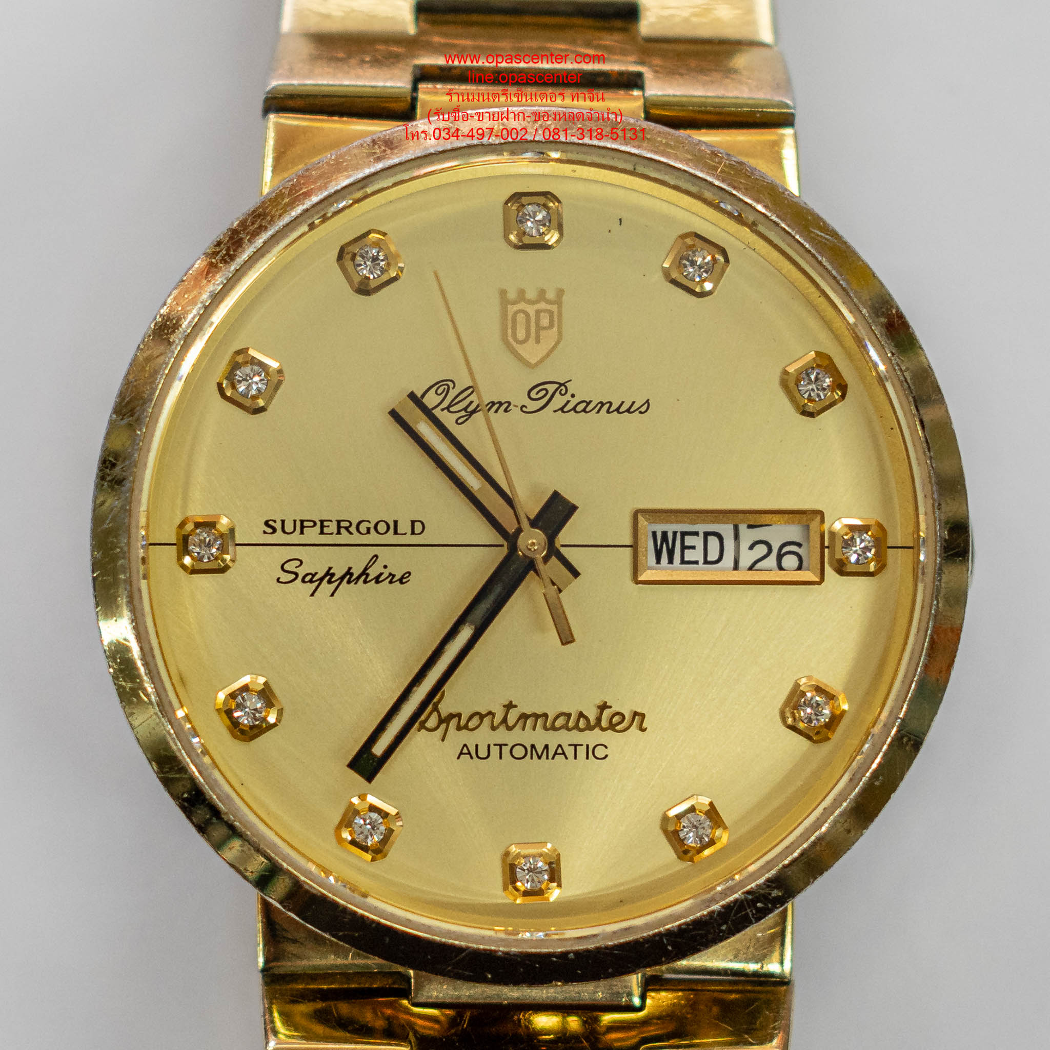 นาฬิกาข้อมือผู้ชาย O.P Sportmaster Automatic สแตนเลสแท้ รุ่น 890-09AM-423 (สีทอง / หน้าปัดทอง) มือสอง สภาพดี