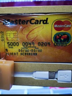 เครื่องดักฟังการสนทนา รูปทรงบัตรเครดิต มาพร้อมกับหูฟังจิ๋ว